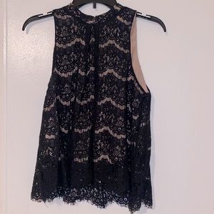 Adorable sleeveless blouse